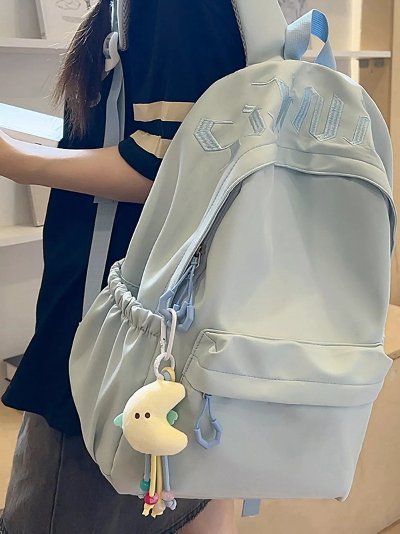 Cedar & Moore Embroidered Letter Backpack, pale blue, medium size with plush chick keychain