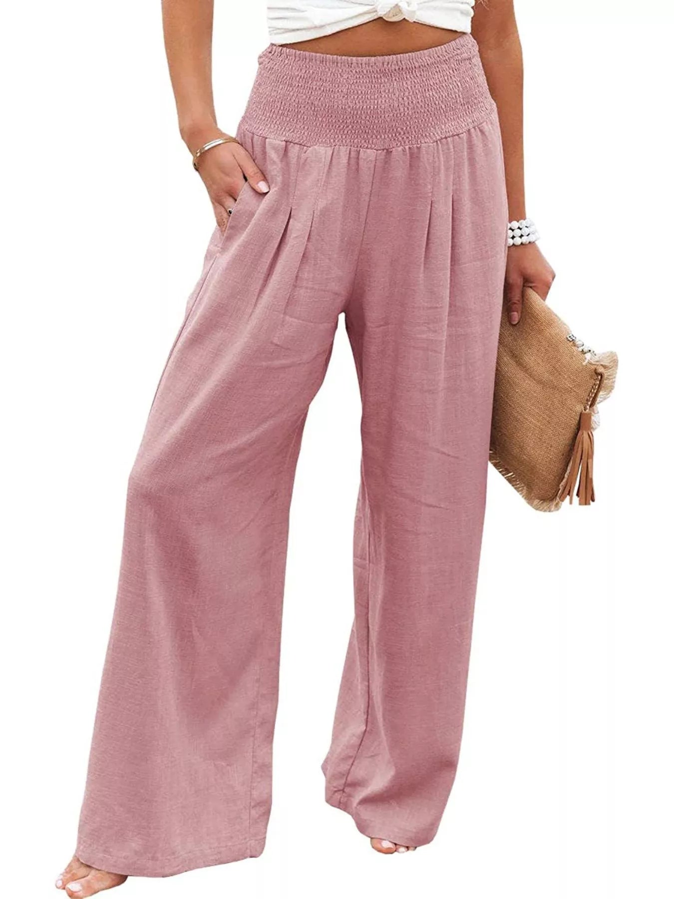 Dusty pink smocked high-waist wide-leg pants with gathered waistband and wide legs