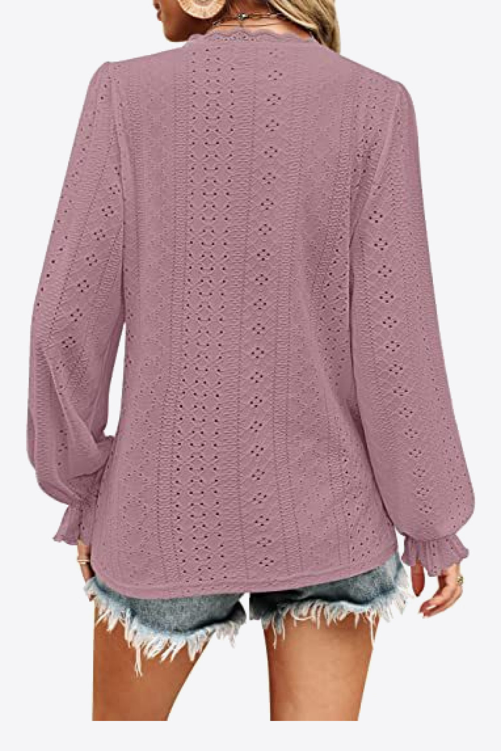 Back view lavender eyelet V-neck blouse with long puff sleeves and flounce cuffs
