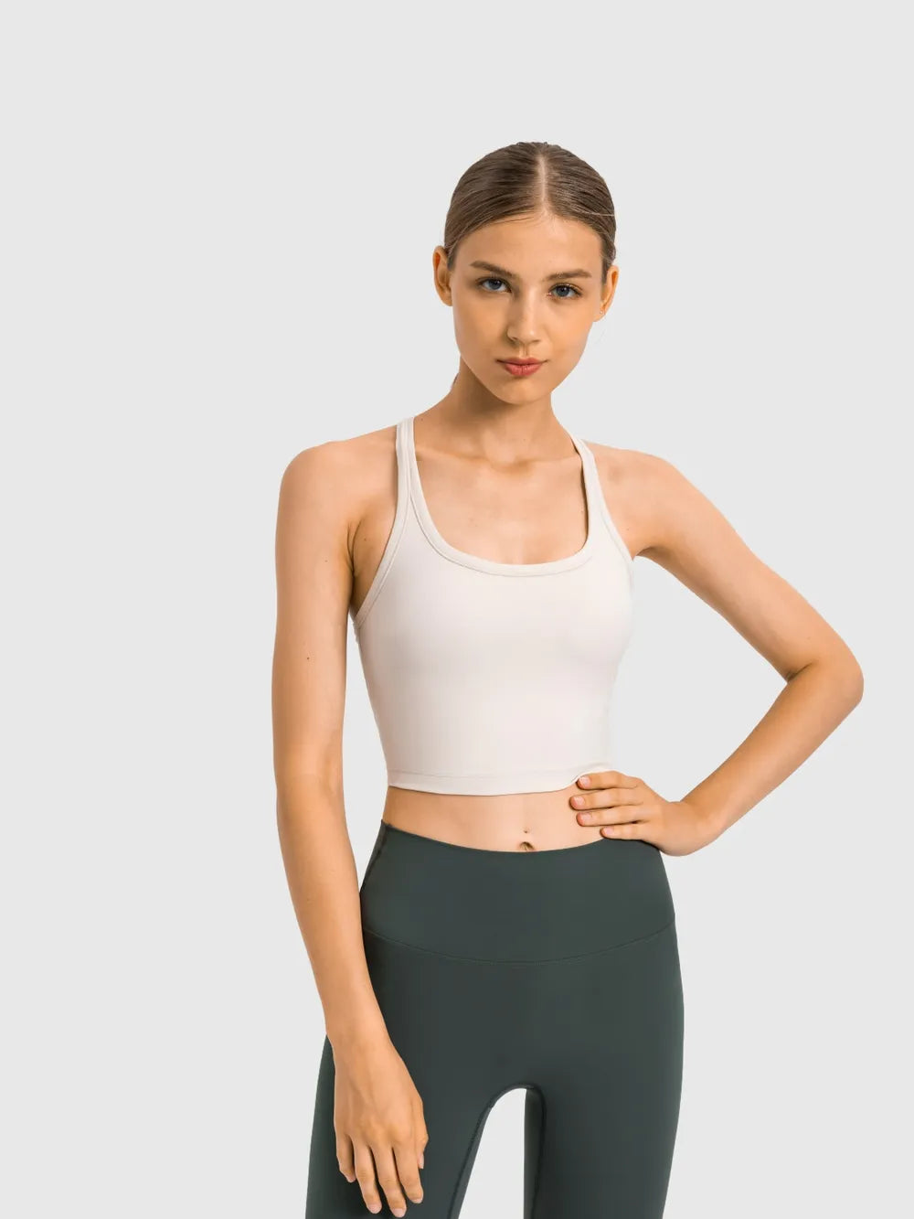 White scoop-neck active tank with racerback straps