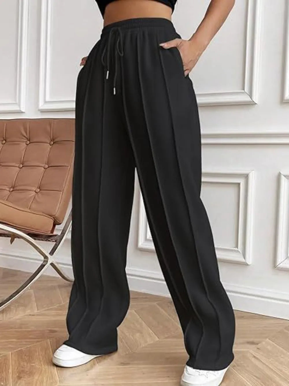Black wide-leg pants with drawstring waistband and side pockets