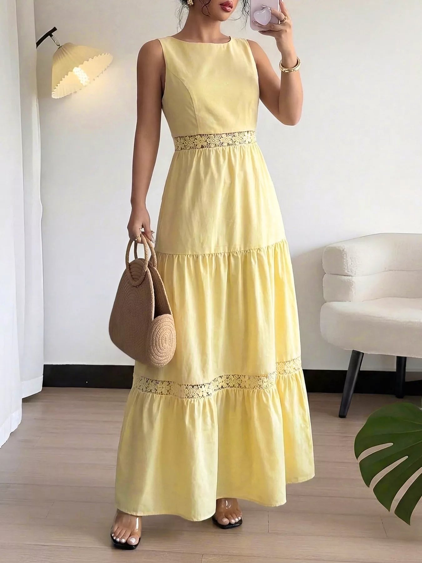 Yellow sleeveless tiered maxi dress with lace-embellished ruffle tiers