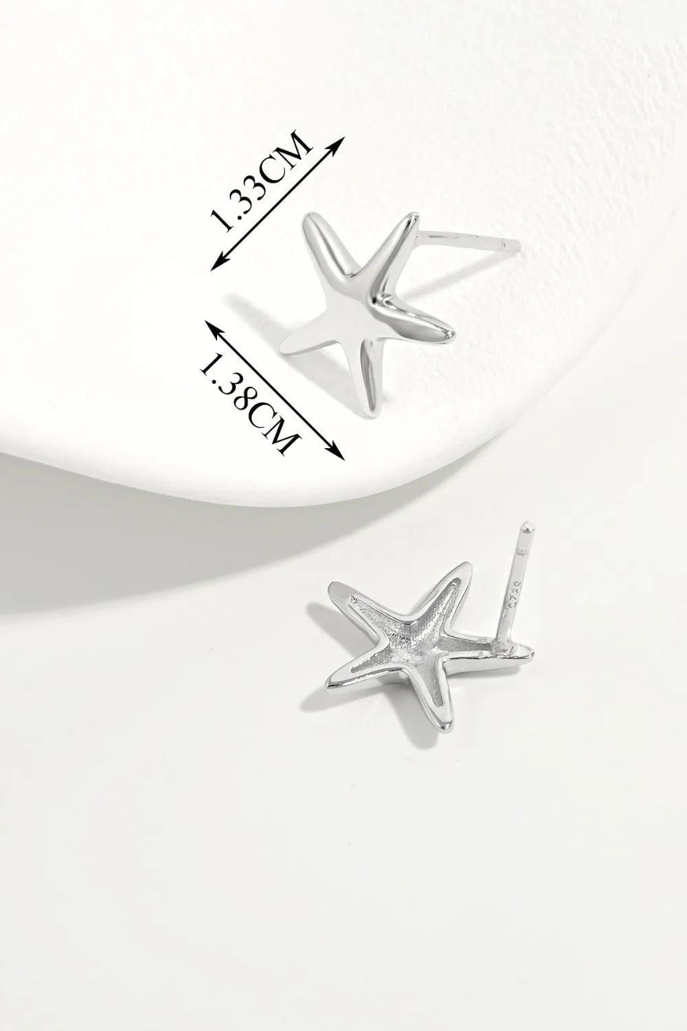 Sterling silver star stud earrings with size 1.3 cm and 1.38 cm