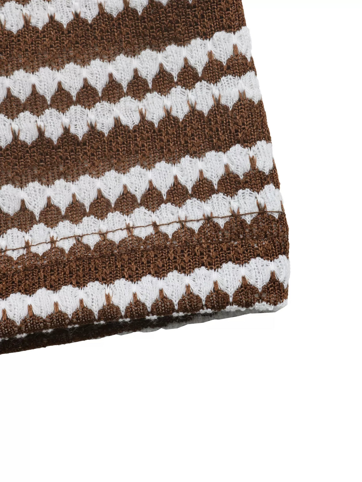Brown and white striped knit dress hem with ribbed edging