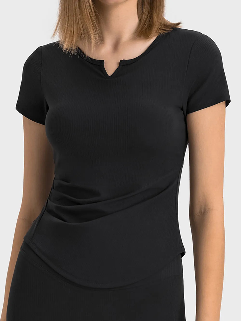 Black active t-shirt with notched V-neck and short sleeves