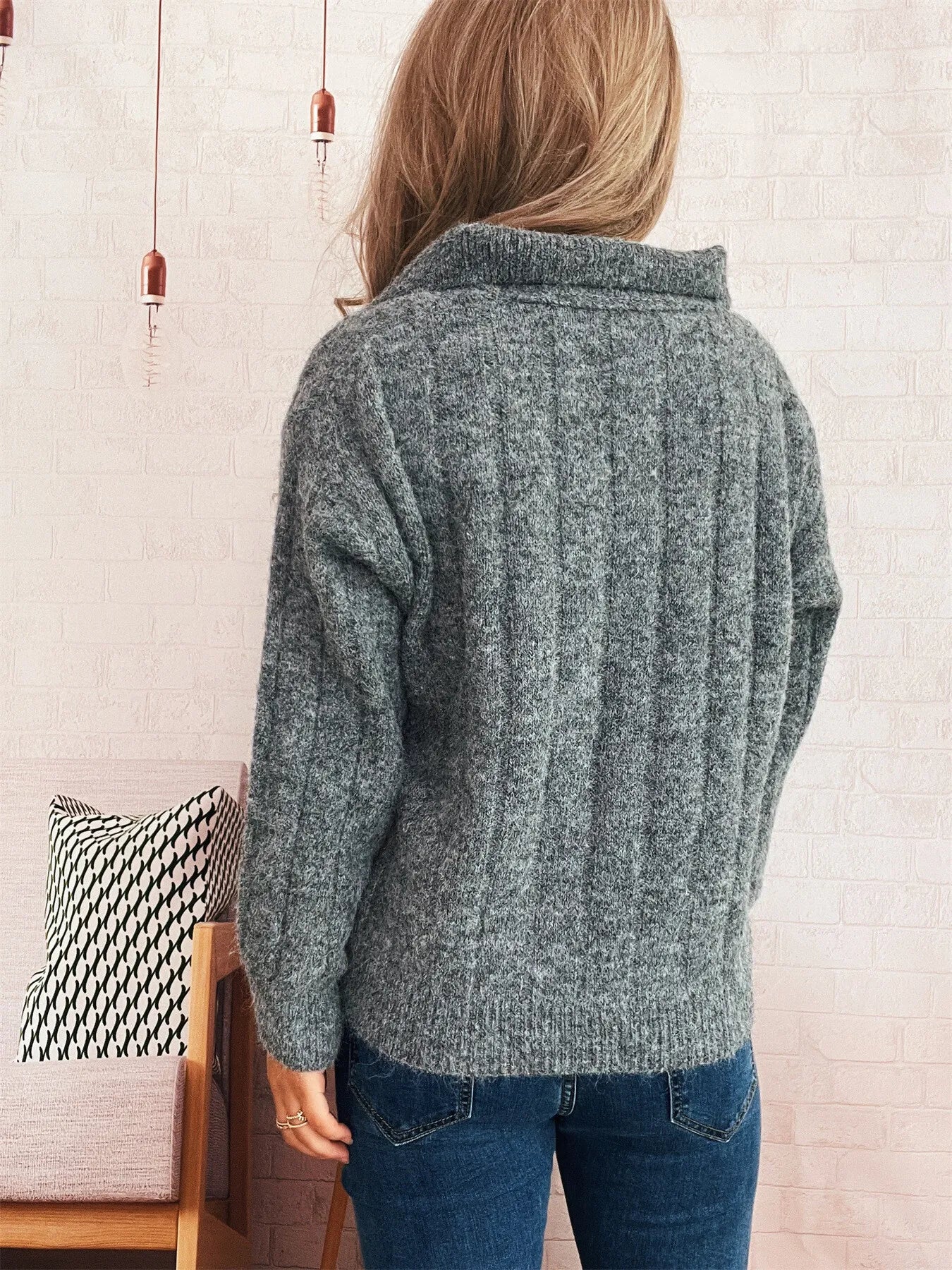 Dark gray ribbed hem quarter zip sweater with long sleeves
