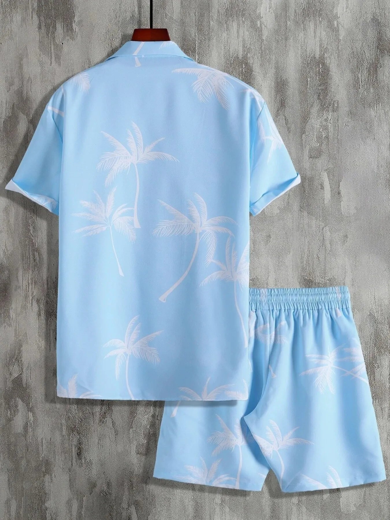 Men's palm print button-up shirt and shorts set, light blue with pale palm silhouettes.