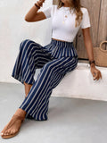 Dark navy striped wide-leg pants with elastic waistband and flowy wide legs