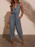 Sleeveless denim jumpsuit with V-neck, button placket, drawstring waist, ankle-length legs