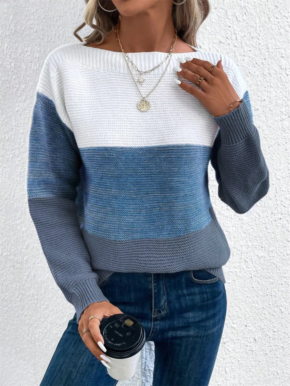 Women’s color block drop-shoulder sweater in cream and blue with long sleeves