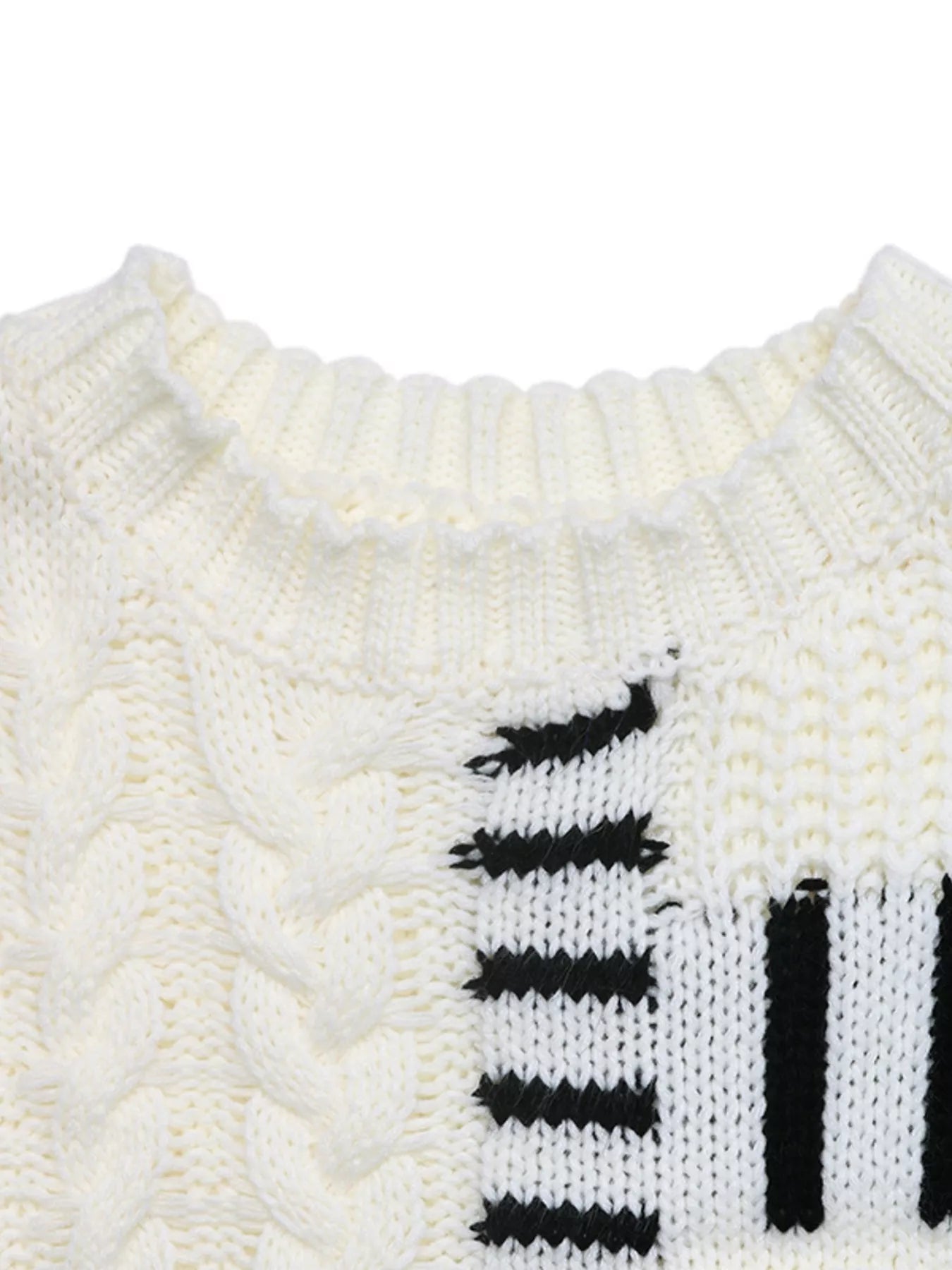 Ivory ribbed round neckline sweater with black stripe graphic on knit panel