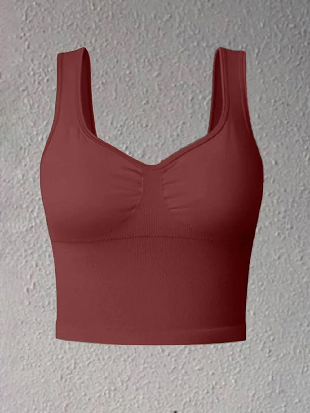 Active tank top in dark maroon, wide V-scoop neck, ruched center bust panel
