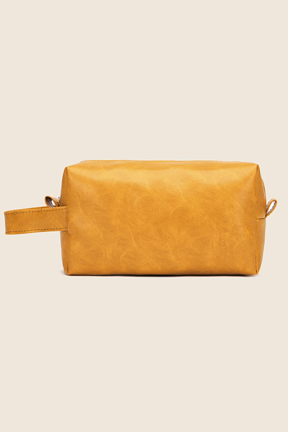 Gold vegan leather makeup bag with top zipper and side pull handles