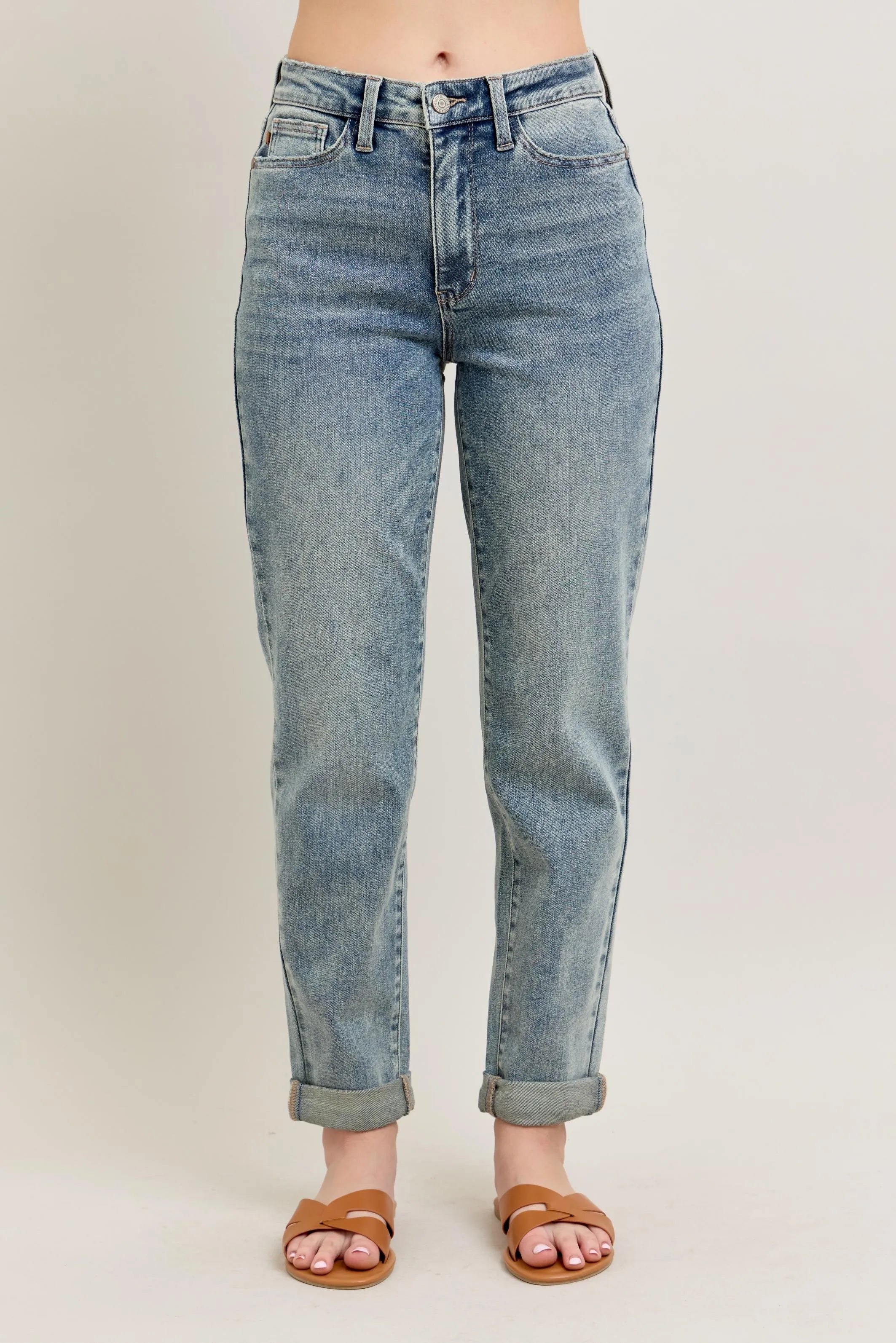 Light blue vintage-wash jeans with double roll cuff and straight leg