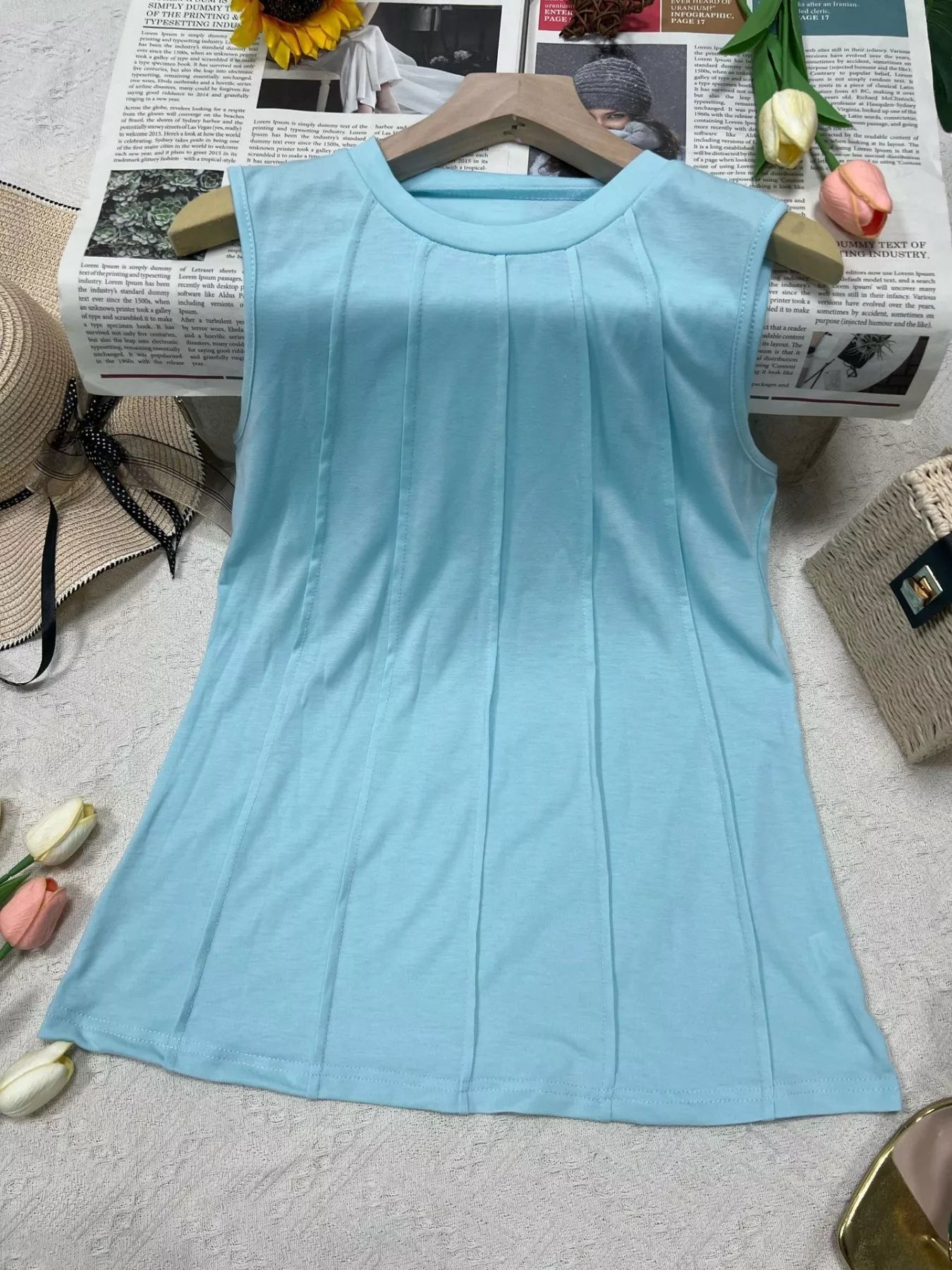 Cedar & Moore Round Neck Tank Top in light blue, sleeveless basic style with front pleat panels.