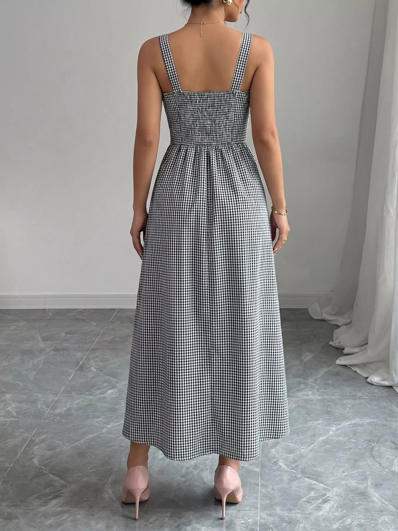 Black-and-white gingham square-back sleeveless midi dress with gathered waist and full skirt