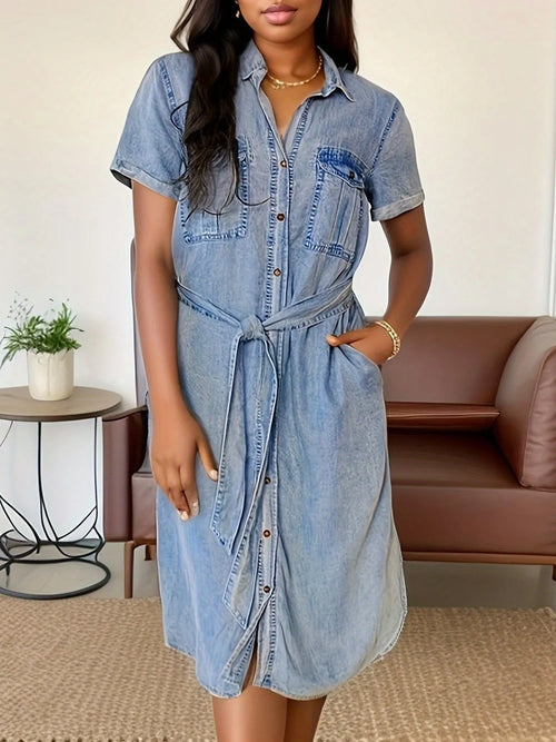 Light blue denim shirt dress, button front and short sleeves, belted waist, front slit