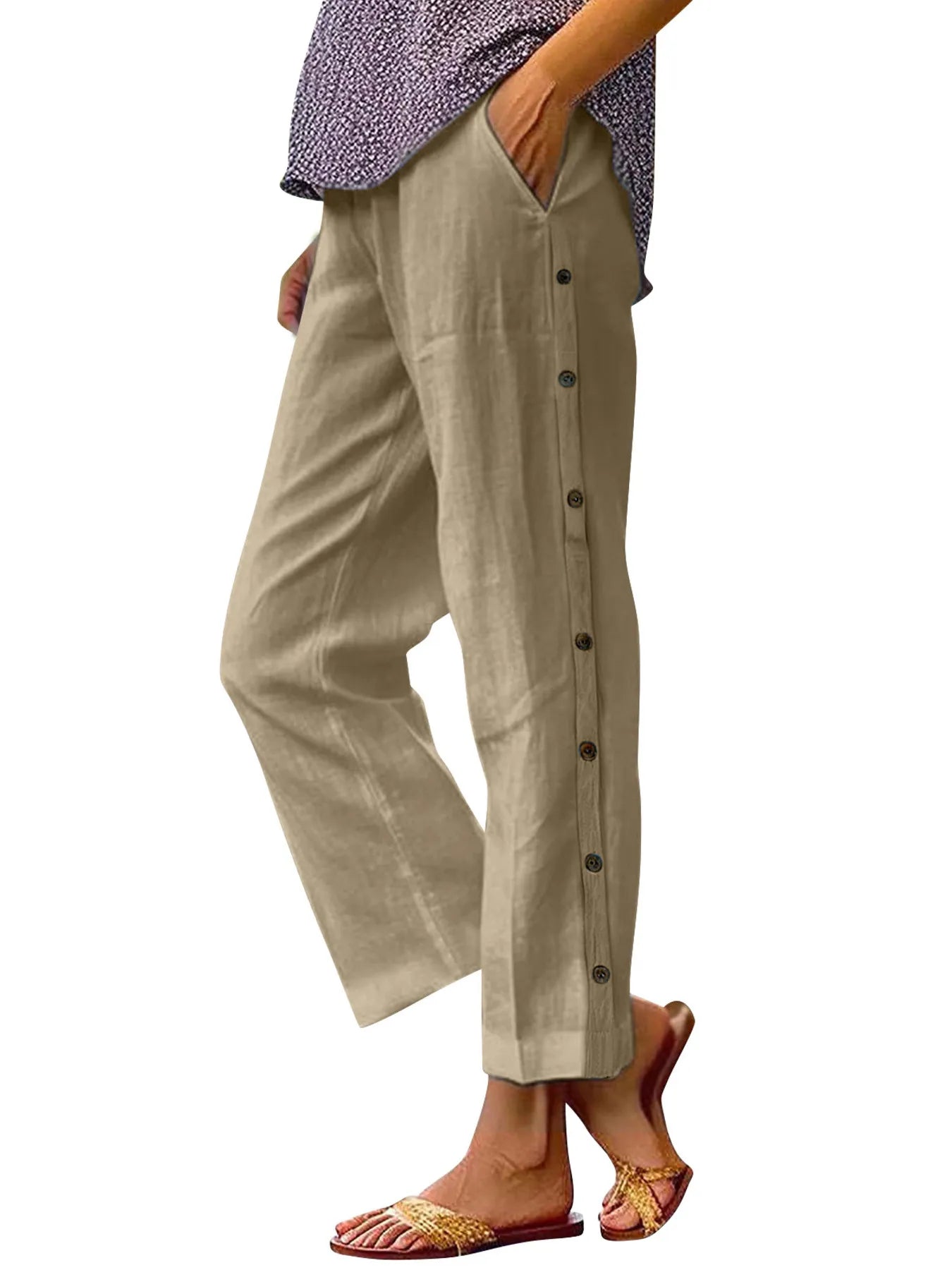 Light beige wide-leg pants with side buttons and roomy straight legs