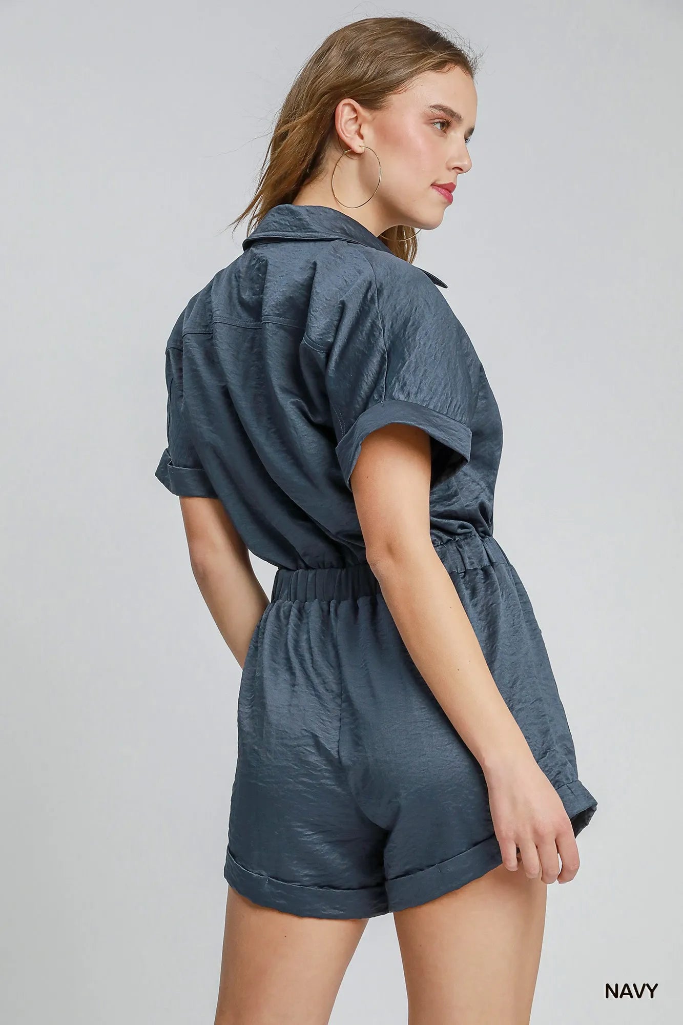 Navy button-front charmeuse romper with elastic waist, back view