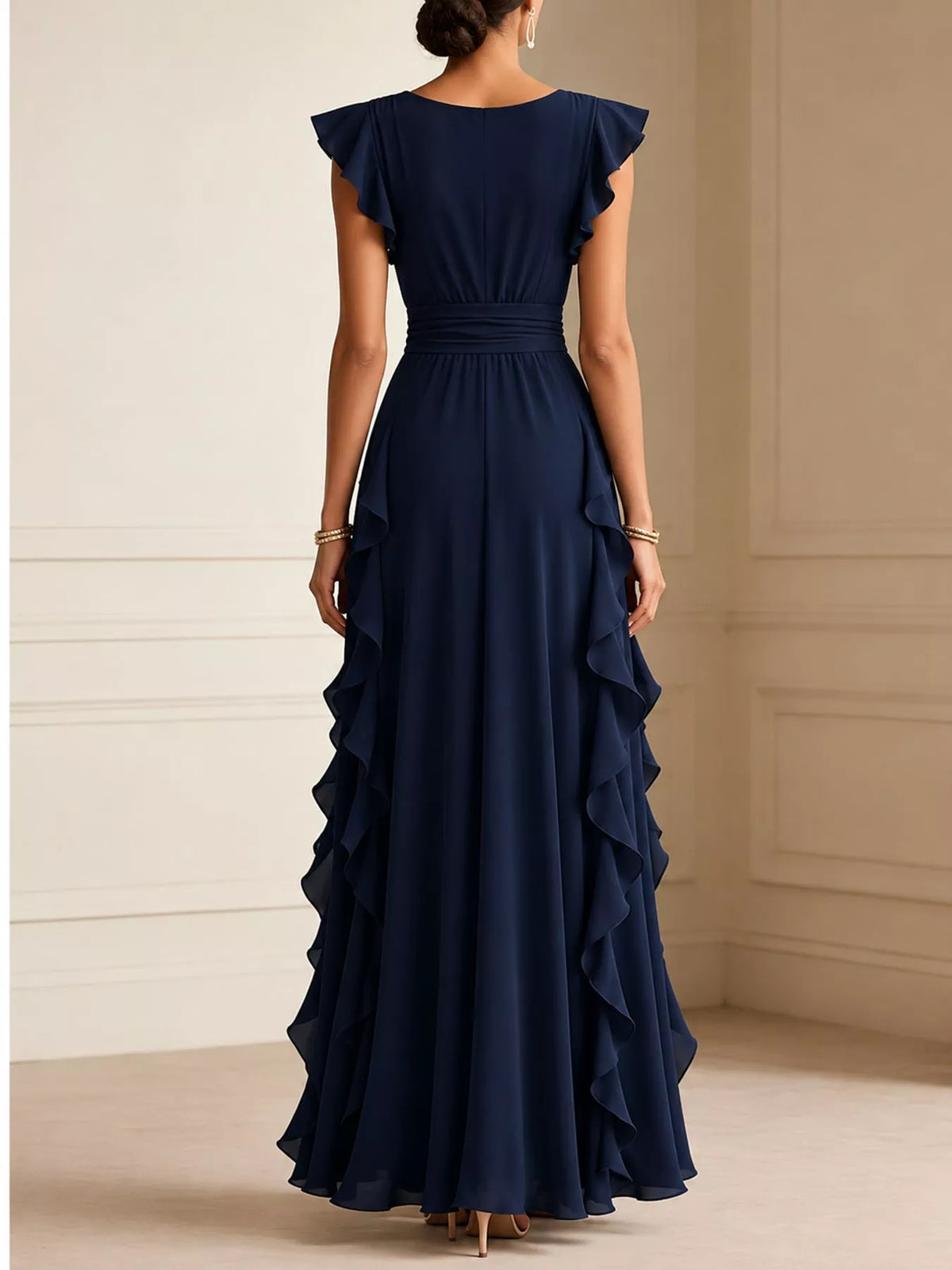 Navy sleeveless maxi dress shown from back; high waist with draped ruffle layers