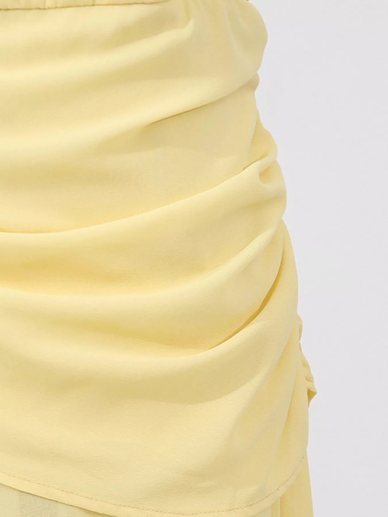 Cedar & Moore Sleeveless Ruched High-Slit Maxi Dress, pale yellow satin ruched fabric closeup