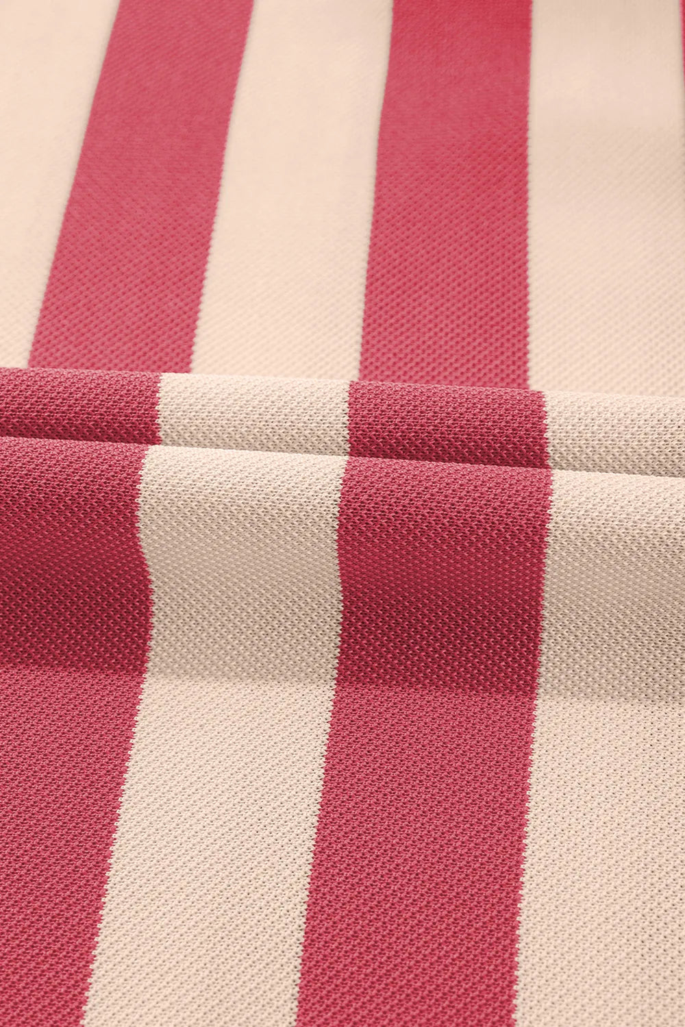 Dusty pink and cream striped woven fabric with textured weave