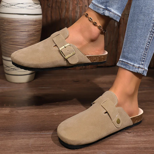 Mocha round-toe slip-on flats with buckle strap and dark rubber sole