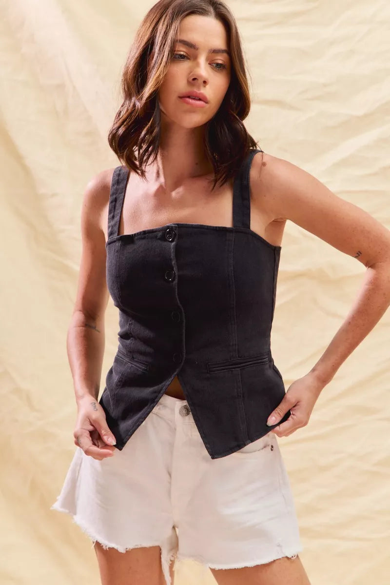 Black denim sleeveless button-front top with visible buttons at center front