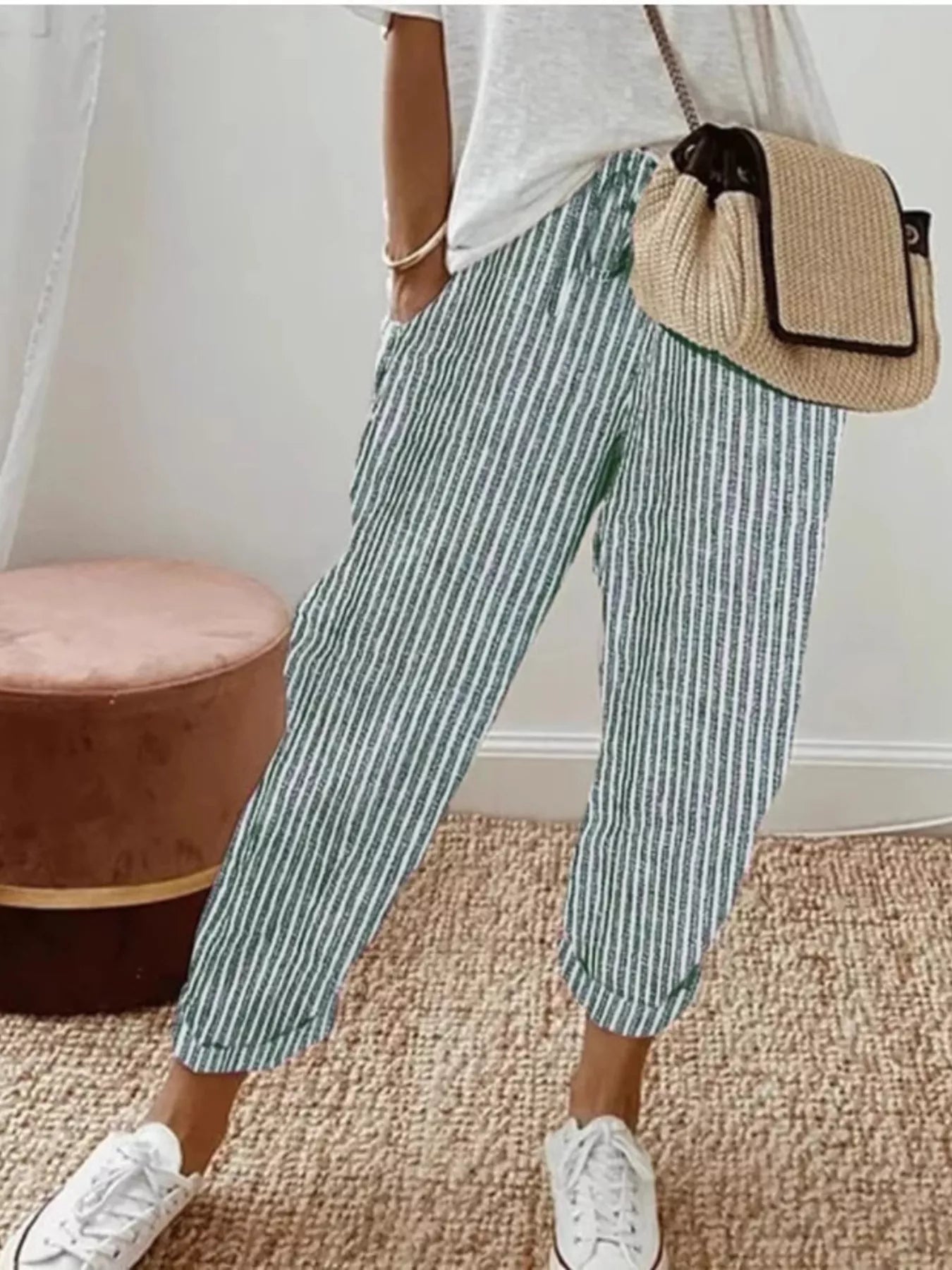 Striped cropped pants with drawstring pockets, green and white vertical stripes