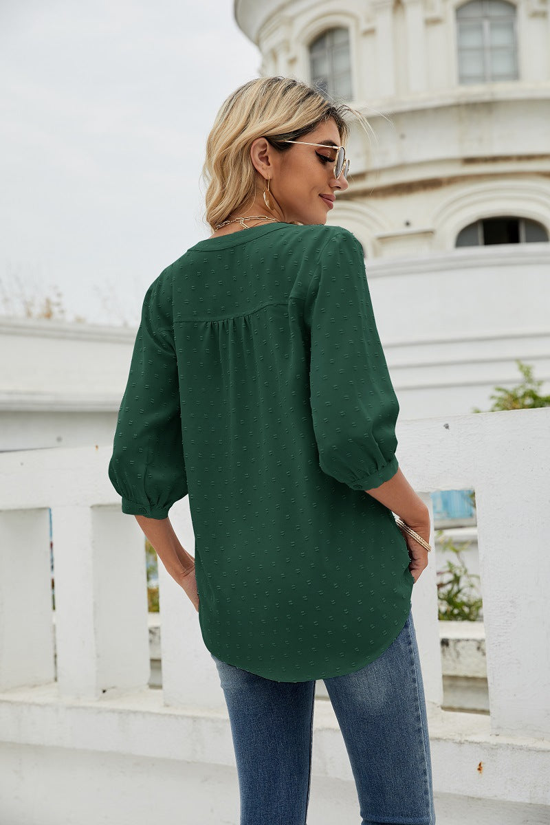 Forest green Swiss-dot blouse with gathered yoke and 3/4 puff sleeves, back view