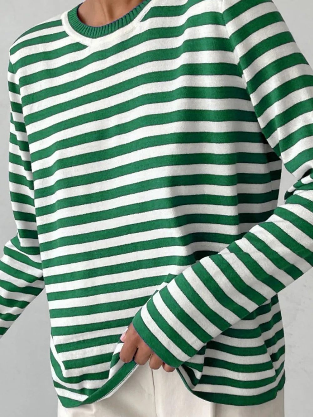 Striped long-sleeve sweater in green and white with crew round neck.