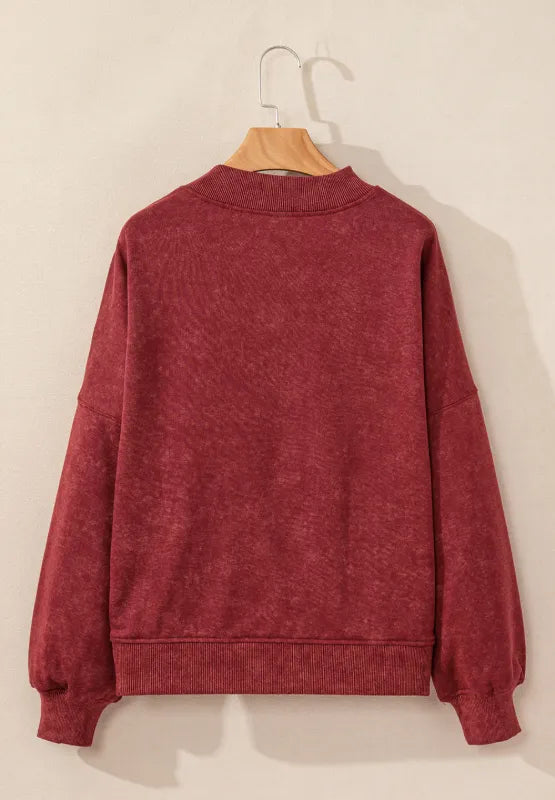 Deep red mock neck dropped-shoulder sweatshirt with ribbed hem and cuffs