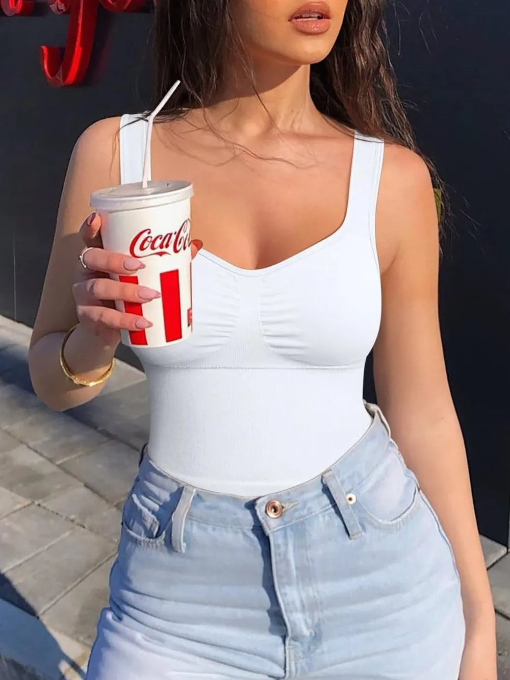 White wide-strap active tank with scoop neck and gathered bust seams
