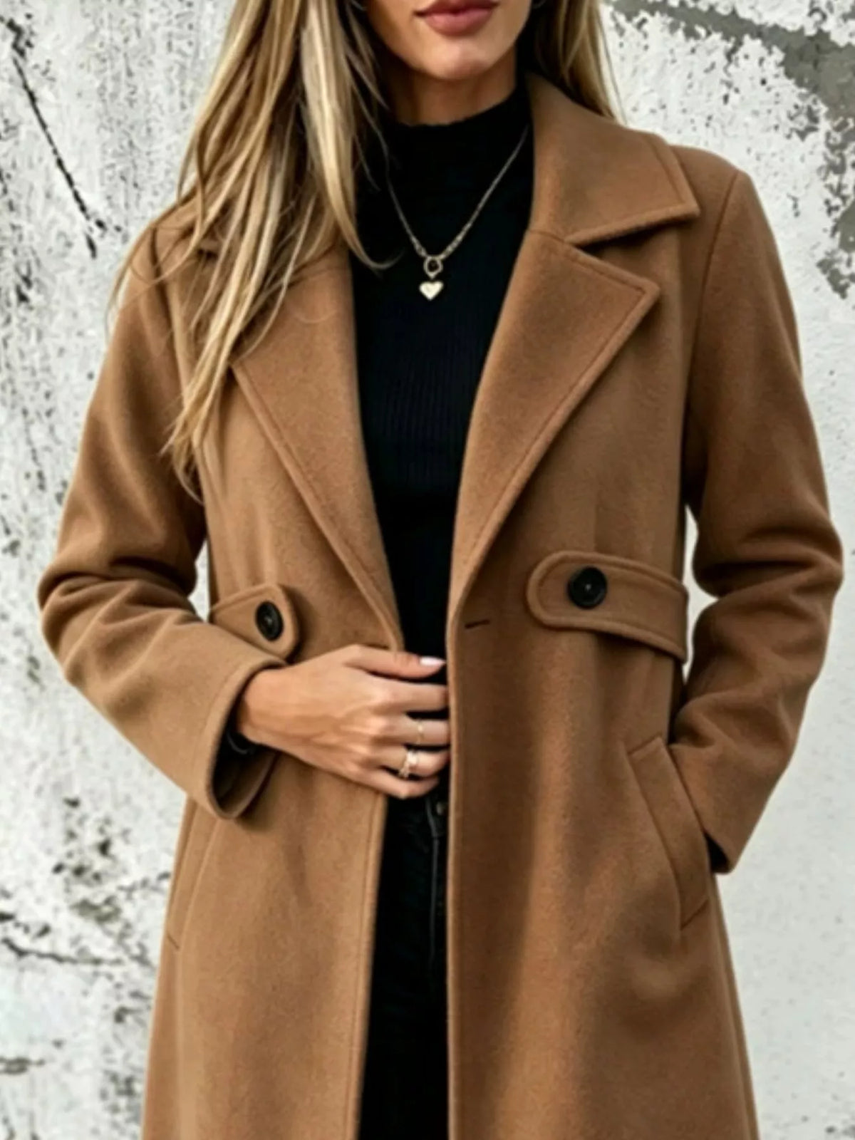 Tan longline button-lapel coat with flap pockets and front buttons