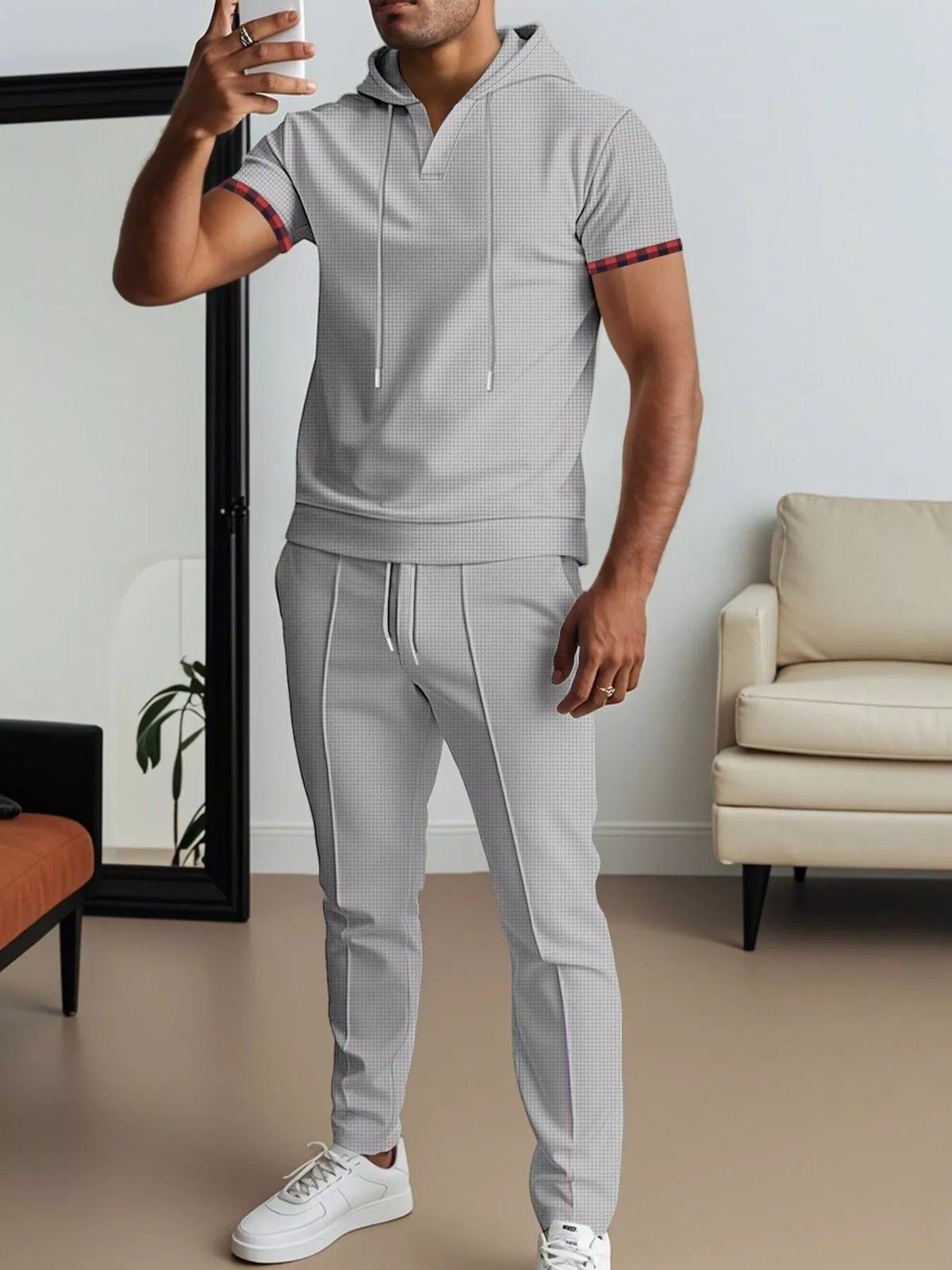 Grey short-sleeve hoodie set with drawstring hood and matching jogger pants