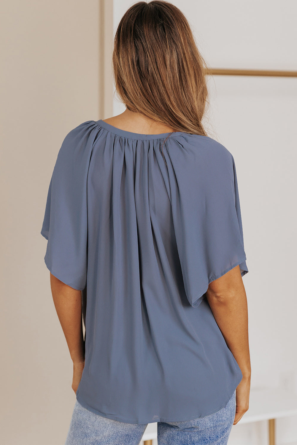 Flutter sleeve top back with gathered yoke at neckline, blue fabric