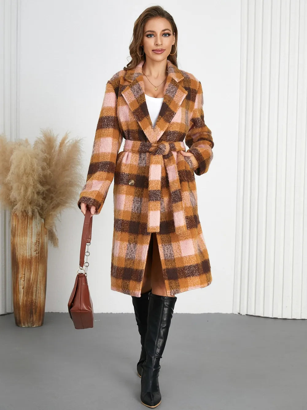 Plaid collared neck coat with waist tie belt, long sleeves, brown-and-orange checks.