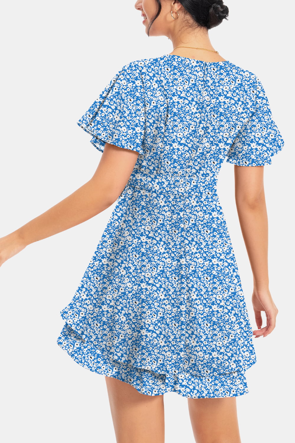 Blue floral surplice mini dress, back view with flutter sleeves