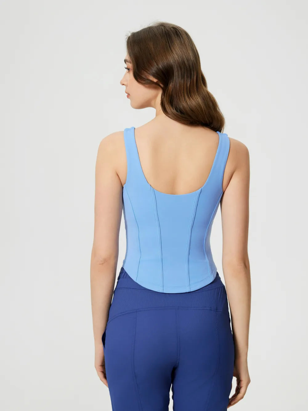 Light blue active tank top with wide straps and scoop back