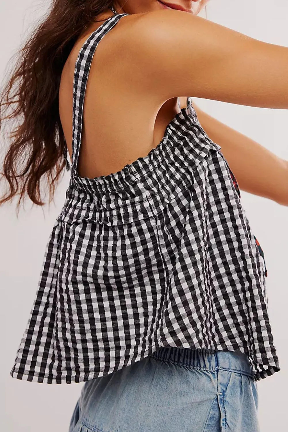 Black gingham cami with square neck and gathered bust with ruffled hem