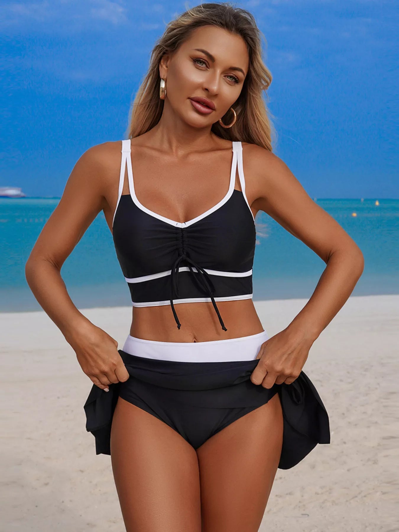Contrast Trim Drawstring Swim Set, black with white accents, two-piece on beach model