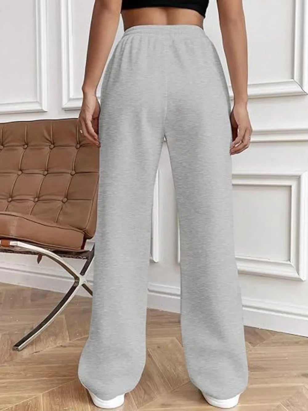 Gray wide-leg pants with drawstring waistband and side pockets