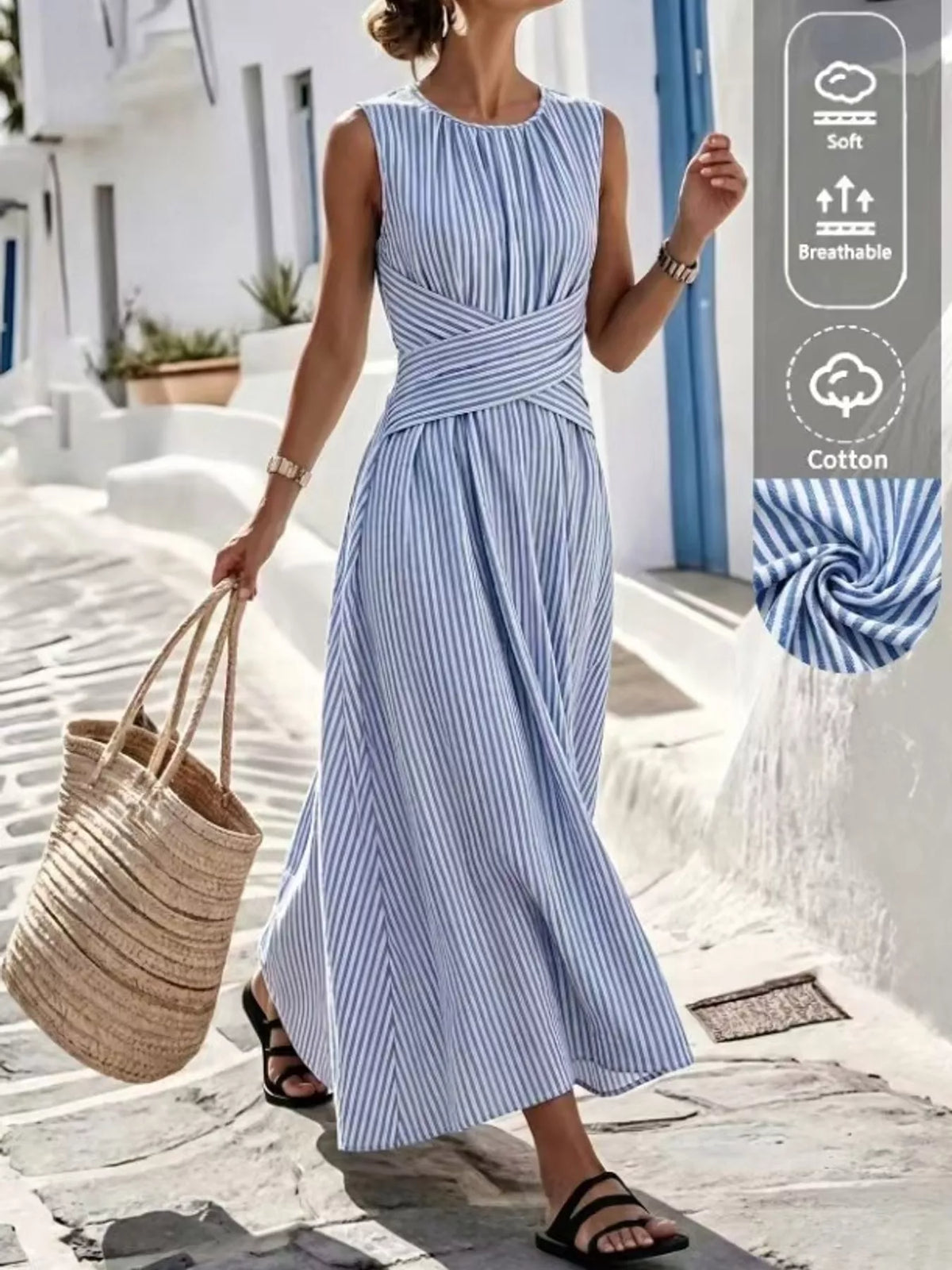 Blue striped sleeveless maxi dress with crisscross waist detail and sleeveless cut