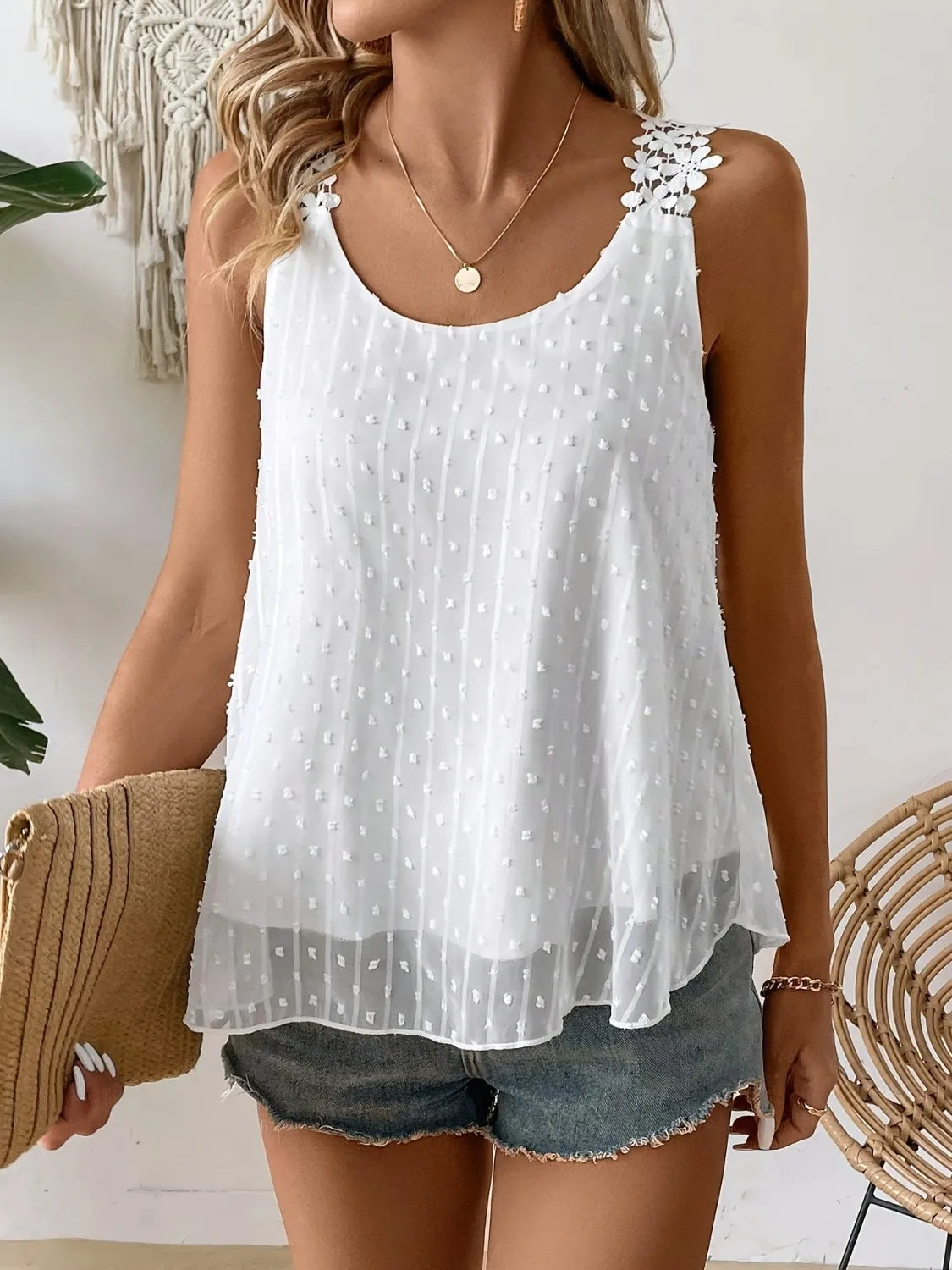 White Swiss-dot scoop neck cami with lace-flower shoulders and ruffled layered hem