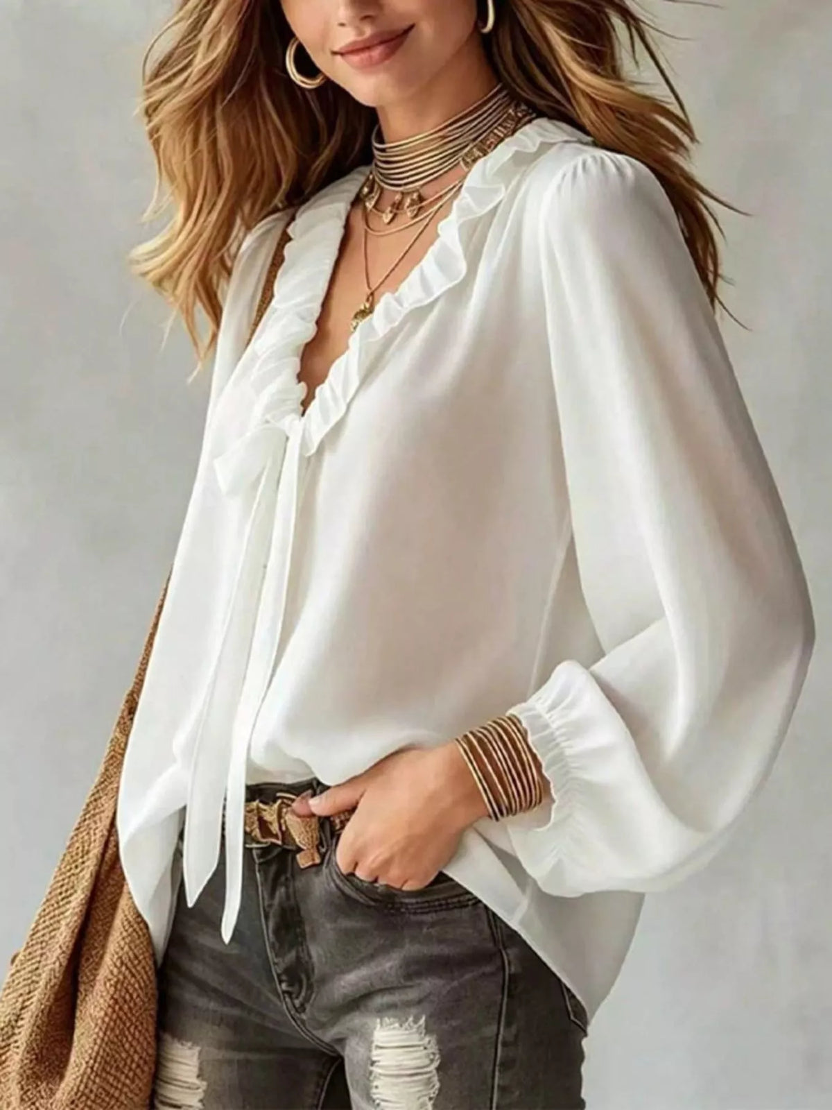 White ruffle V-neck blouse top with front tie detail and long puff sleeves