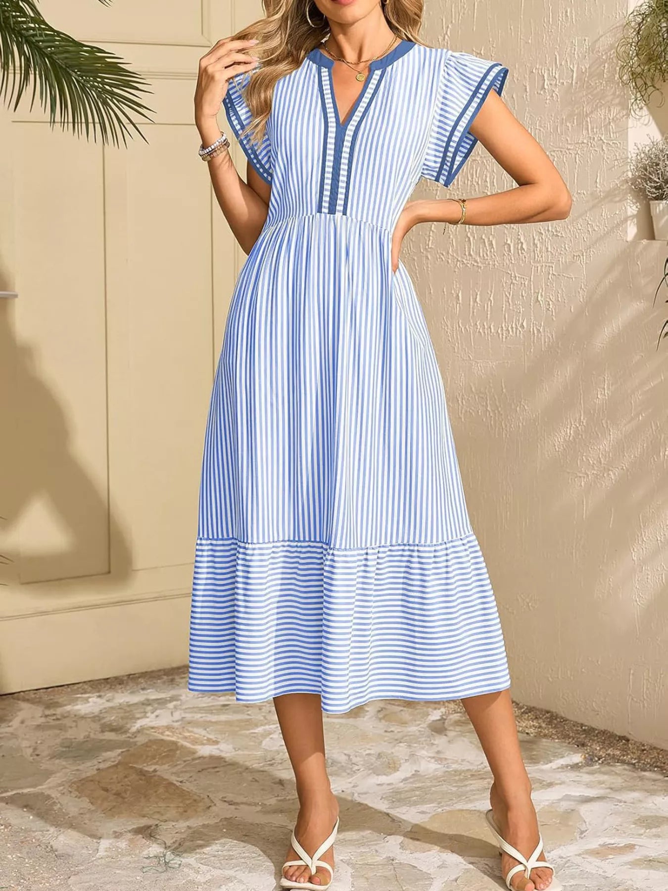 Sky blue striped midi dress with ruffle cap sleeves and V-neck; gathered waist