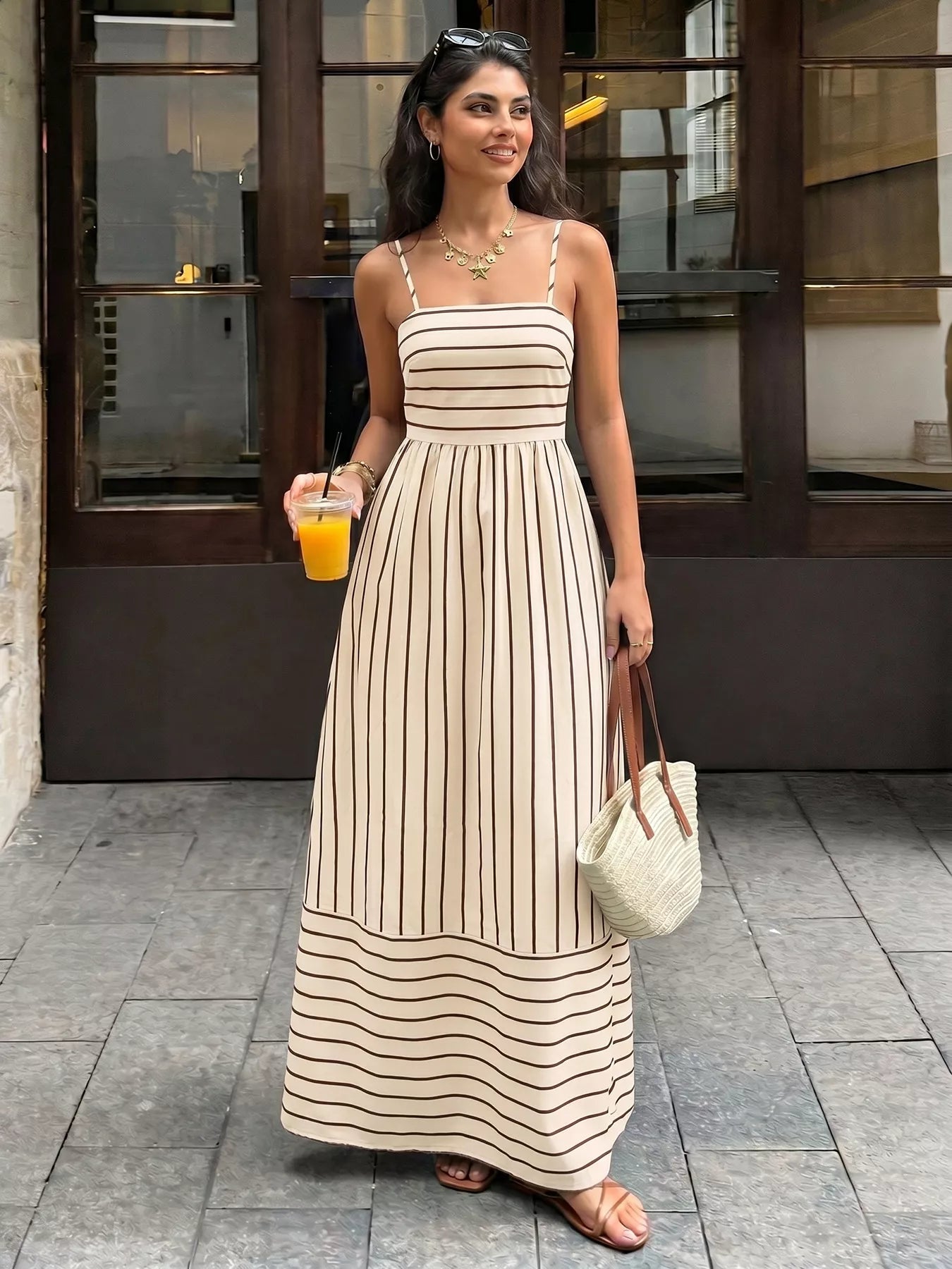 Cedar & Moore Striped Print Spaghetti Strap Maxi Dress by Trendsi in beige with brown stripes; long flowy silhouette