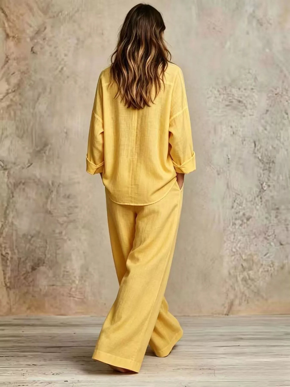 Yellow wide-leg button shirt and pants set, back view, cuffed sleeves, wide trousers.
