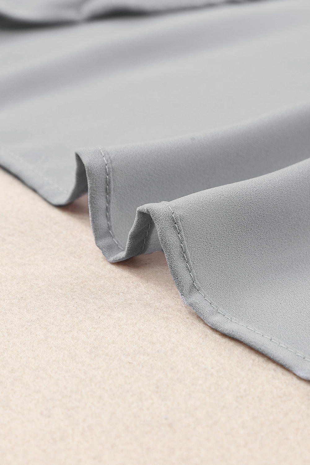 Flutter sleeve top with gathered notched neckline detail, light fabric