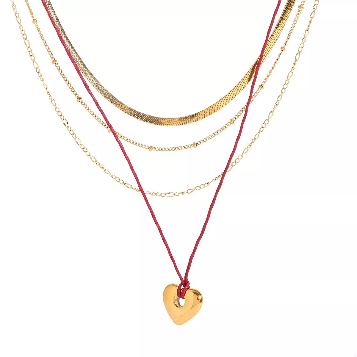 Four-layered gold heart necklace with red cord and small gold heart pendant, studio view.
